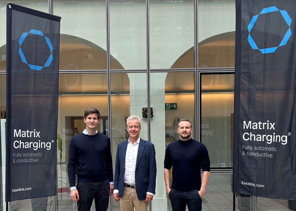 YASA CEO Chris Harris with former Business Secretary Greg Clark and YASA’s early-career engineers.